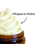 Close-up of whipped body butter texture in an open jar, with the words Whipped to Perfection