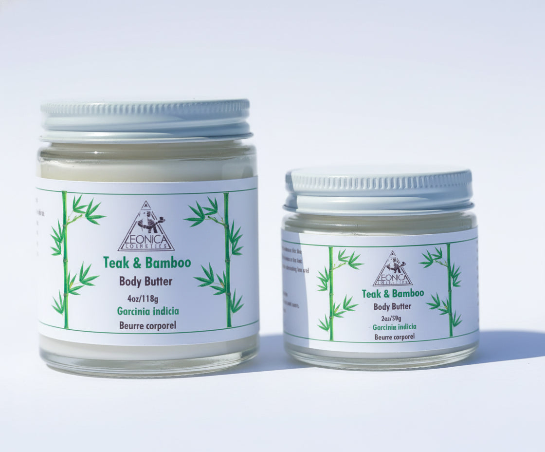 Two jars of Leonica Cosmetics Teak & Bamboo Body Butter, one larger and one smaller, with white lids and labels featuring the product name and bamboo graphics.